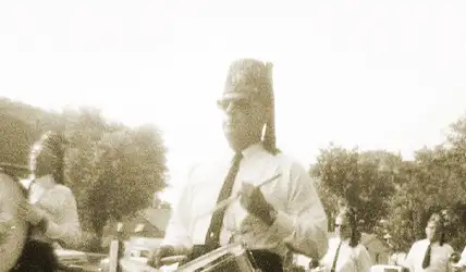 Jim Davis marching as a shriner.