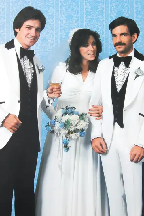 Models in white and black tuxedos from Jim's Formal Wear