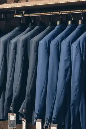 Hanging rack of men's suit coats