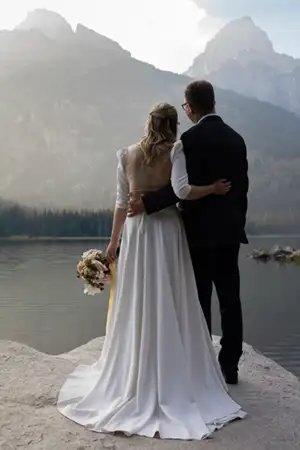 Newlyweds looking at a beautiful view