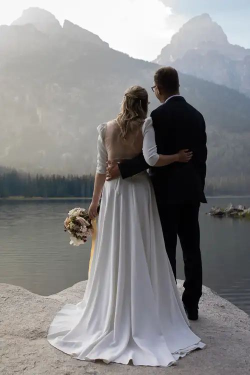 Newlyweds looking at a beautiful view